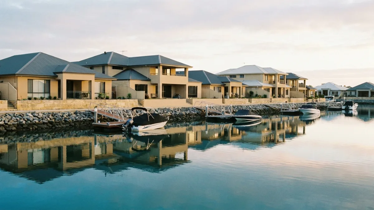 Canal-front homes with private pontoons on still water, typical of Labrador on the Gold Coast